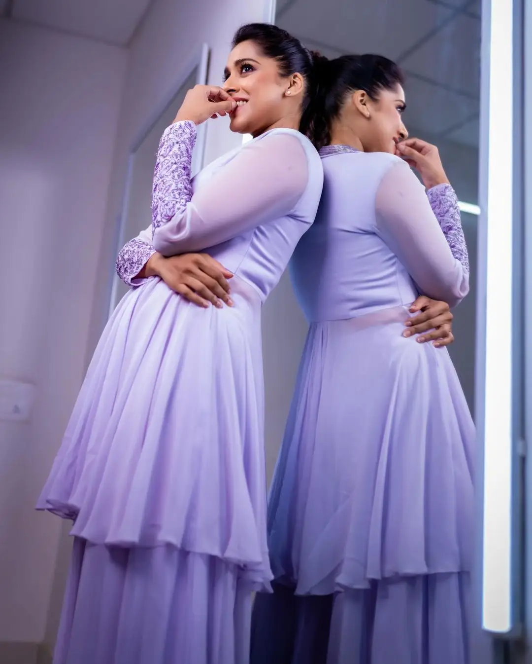 ETV Anchor Rashmi Gautam Photos In Violet Gown